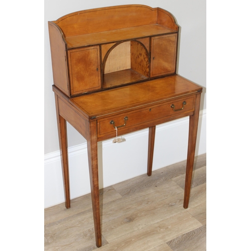 133 - An Edwardian satinwood lady's desk or Bonheur Du Jour with single drawer and fold out writing slide,... 