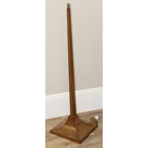 243 - An impressive oak standard lamp with unusual shaped base, approx 160cm tall