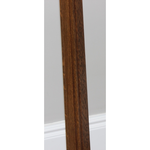 243 - An impressive oak standard lamp with unusual shaped base, approx 160cm tall