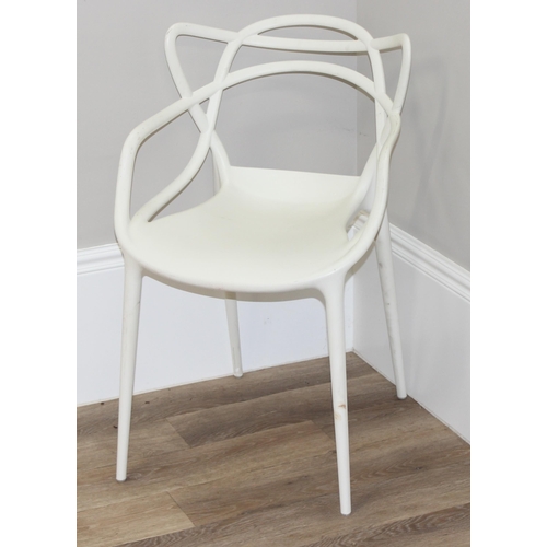 66 - Masters by Kartell of Italy, a retro style white plastic chair with shaped back, approx 83cm tall