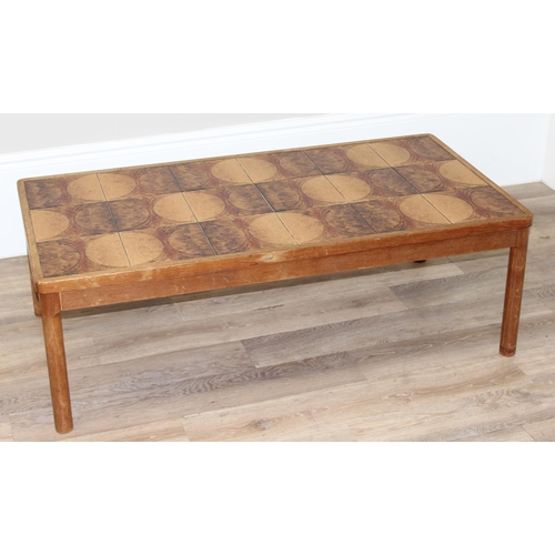 58 - A retro Danish tile-top coffee table by Trioh, approx 126cm wide x 65cm deep x 43cm tall