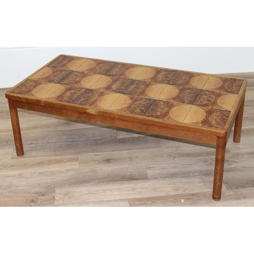 58 - A retro Danish tile-top coffee table by Trioh, approx 126cm wide x 65cm deep x 43cm tall