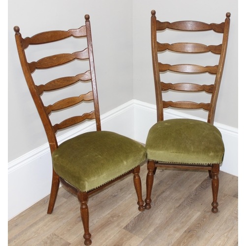 107 - A pair of unusual high ladder back oak chairs with green upholstered seats, approx 112cm tall