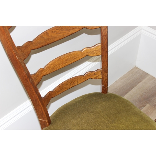 107 - A pair of unusual high ladder back oak chairs with green upholstered seats, approx 112cm tall