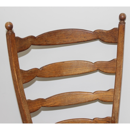 107 - A pair of unusual high ladder back oak chairs with green upholstered seats, approx 112cm tall