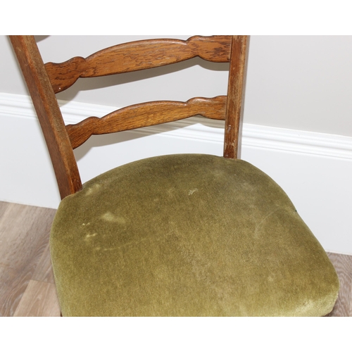 107 - A pair of unusual high ladder back oak chairs with green upholstered seats, approx 112cm tall