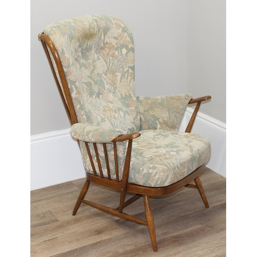 189 - Ercol floral print armchair with stick back, approx 76cm wide x 82cm deep x 108cm tall