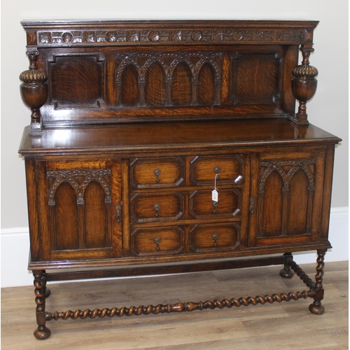 151 - A 17th century style carved oak sideboard with barleytwist supports, approx 152cm wide x 51cm deep x... 