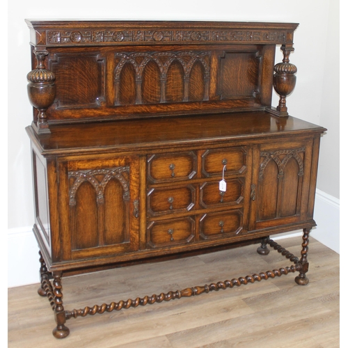 151 - A 17th century style carved oak sideboard with barleytwist supports, approx 152cm wide x 51cm deep x... 