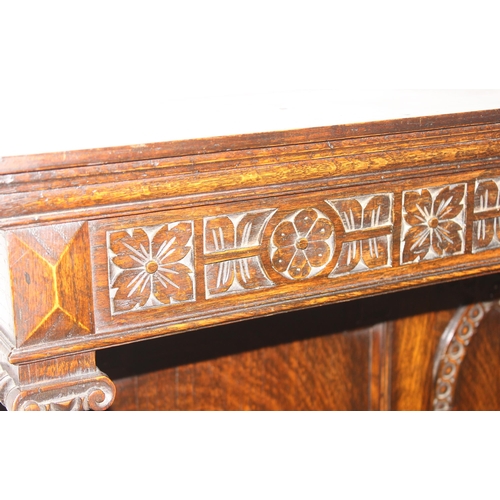 151 - A 17th century style carved oak sideboard with barleytwist supports, approx 152cm wide x 51cm deep x... 