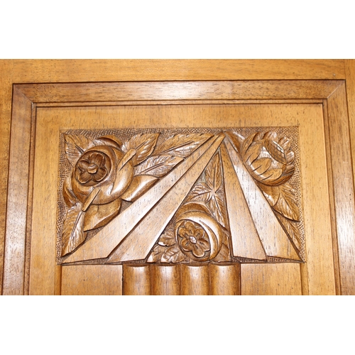 68 - An unusual Art Deco period hall or display cabinet believed to be satinwood with carved Deco motifs ... 