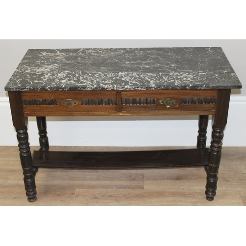 129 - An antique marble topped side table or wash stand with 2 drawers and brass handles, approx 107cm wid... 