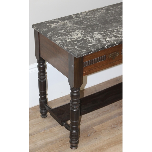 129 - An antique marble topped side table or wash stand with 2 drawers and brass handles, approx 107cm wid... 