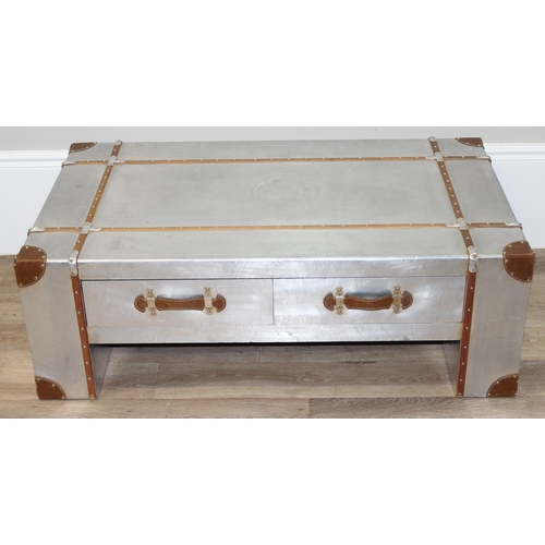 3 - An Aviator style aluminium coffee table with wooden straps and leather corners and handles, with 4 d... 