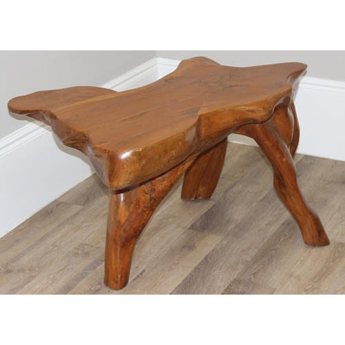 91 - A heavy interesting carved root wood coffee or side table, approx 110cm wide x 65cm deep x 62cm tall