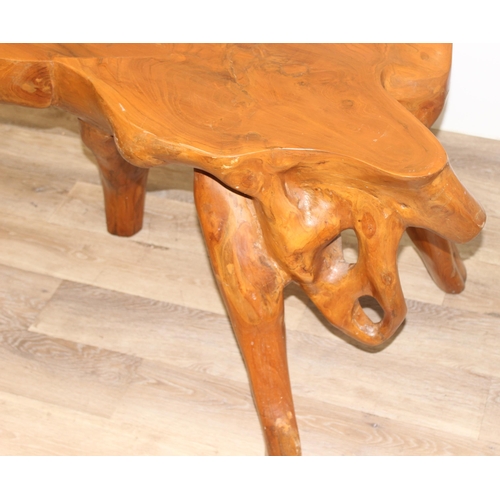 91 - A heavy interesting carved root wood coffee or side table, approx 110cm wide x 65cm deep x 62cm tall