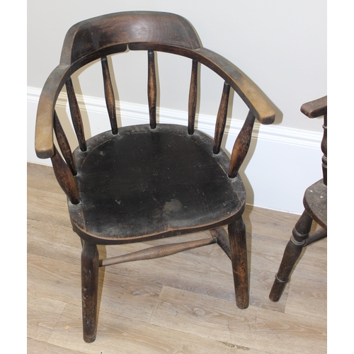 172 - 2 vintage farmhouse armchairs, a bow chair with oak seat and a vintage wheelback with elm seat (2)