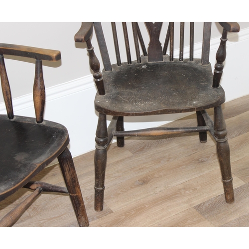 172 - 2 vintage farmhouse armchairs, a bow chair with oak seat and a vintage wheelback with elm seat (2)