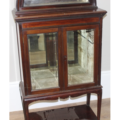 186 - A rare antique mahogany display cabinet with 2 glazed doors under a very unusual dome topped display... 