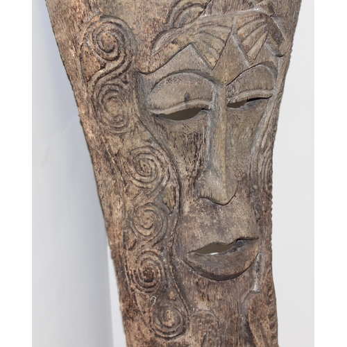 278 - A very large vintage carved wooden tribal mask sculpture, believed to be palm wood and possibly from... 