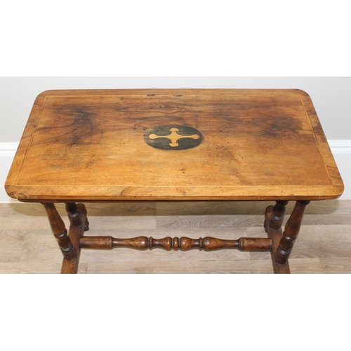 171 - An antique mahogany side table with inlaid wooden top and turned supports, approx 82cm wide x 40cm d... 