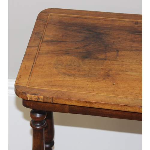 171 - An antique mahogany side table with inlaid wooden top and turned supports, approx 82cm wide x 40cm d... 