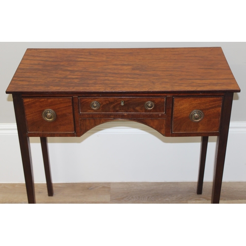 124 - A 19th century mahogany hall table or low boy with 3 drawers and round bras handles, approx 79cm wid... 