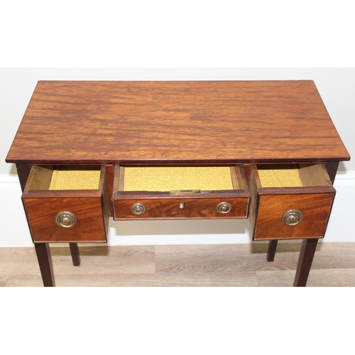 124 - A 19th century mahogany hall table or low boy with 3 drawers and round bras handles, approx 79cm wid... 