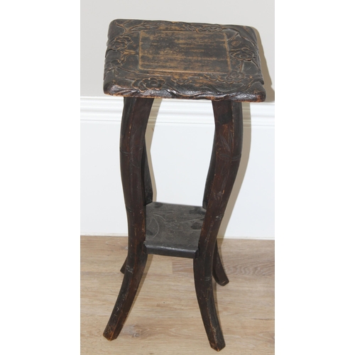 2 - An early 20th century Japanese designed carved side or lamp table with various markings, possibly fo... 