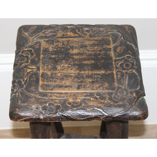 2 - An early 20th century Japanese designed carved side or lamp table with various markings, possibly fo... 