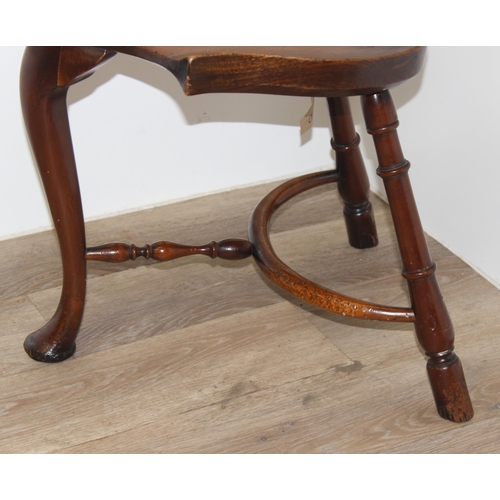 89 - A vintage Stewart Linford style elm seated saddle seated stool, unsigned, approx 39cm wide x 35cm de... 