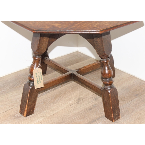 85 - An early 20th century octagonal topped oak low table, approx 56cm wide x 56cm deep x 41cm tall