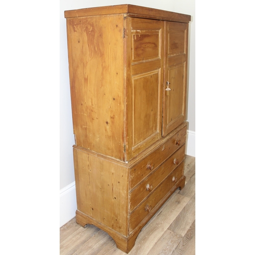 84 - A Victorian pine linen press on 3 drawer chest of drawers base, the base with bracket feet and turne... 