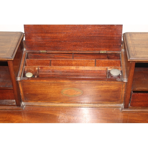 120 - A 19th century ladies writing or work desk with Sheraton inlay and fretwork details, a central stati... 