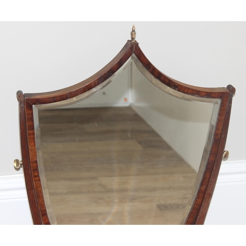 17 - An antique mahogany table top mirror of shield form with 2 drawers to base, approx 51cm wide x 73cm ... 