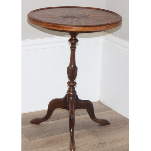 109 - An unusual star topped marquetry wine table with mahogany tripod base, approx 39cm in diameter x 51c... 