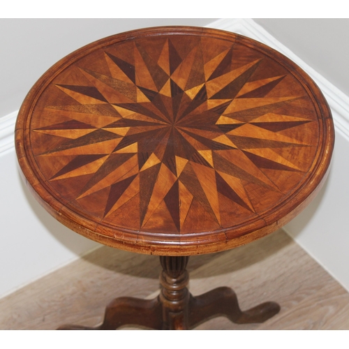 109 - An unusual star topped marquetry wine table with mahogany tripod base, approx 39cm in diameter x 51c... 