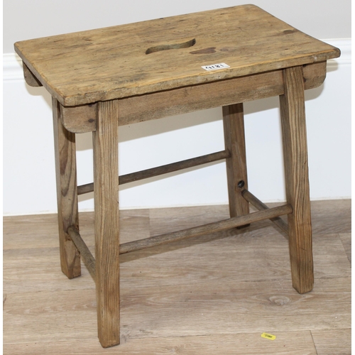 190 - A rustic pine stool, approx 45cm wide x 30cm deep x 45cm tall