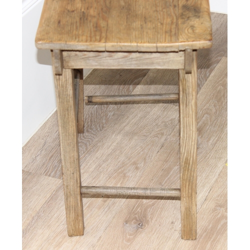 190 - A rustic pine stool, approx 45cm wide x 30cm deep x 45cm tall