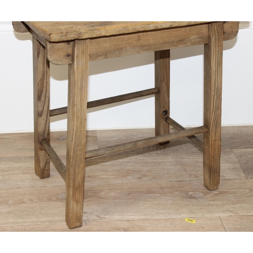 190 - A rustic pine stool, approx 45cm wide x 30cm deep x 45cm tall