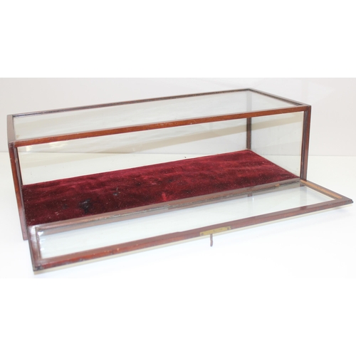 281 - An antique mahogany table top display case with key, approx 55cm wide x 23cm deep x 17cm tall