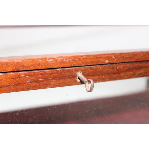 281 - An antique mahogany table top display case with key, approx 55cm wide x 23cm deep x 17cm tall