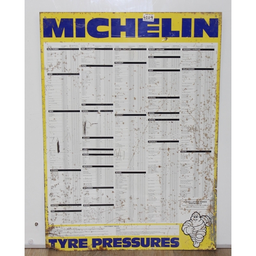 587 - Vintage metal Michelin tyre pressures wall sign, approx 87cm x 63cm