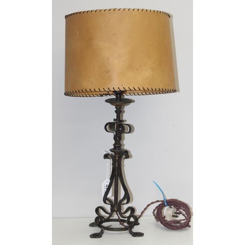 249 - In the manner of WAS Benson, an Arts & Crafts period table lamp of copper body with sinuous design a... 