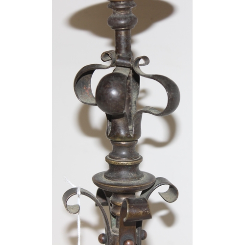 249 - In the manner of WAS Benson, an Arts & Crafts period table lamp of copper body with sinuous design a... 