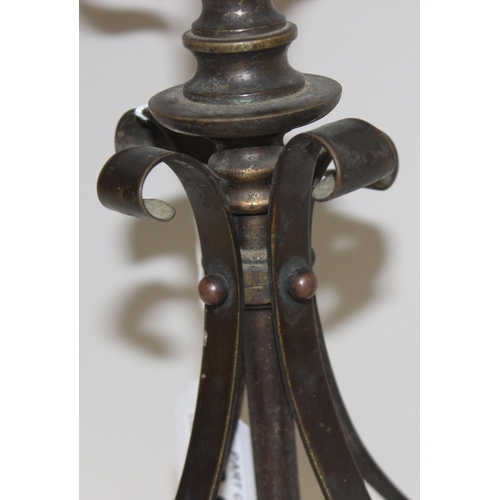 249 - In the manner of WAS Benson, an Arts & Crafts period table lamp of copper body with sinuous design a... 