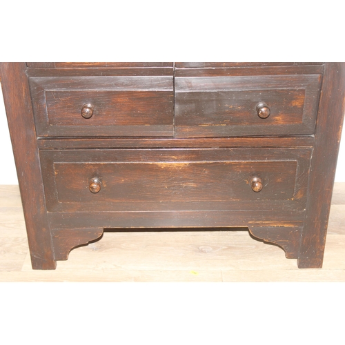 159 - An antique style oak 2 door and 2 drawer side cabinet with shaped iron hinges, approx 81cm wide x 46... 