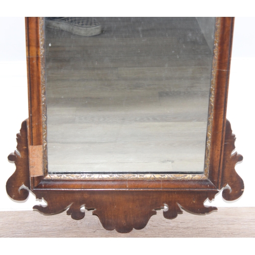 626 - A Georgian mahogany framed fretwork mirror with carved eagle design, approx 82cm x 50cm