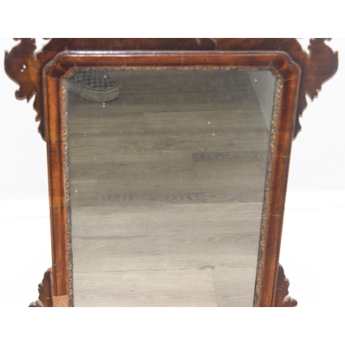 626 - A Georgian mahogany framed fretwork mirror with carved eagle design, approx 82cm x 50cm