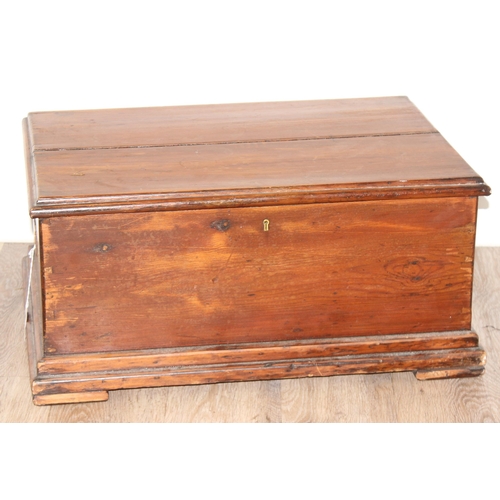 192 - Vintage pine trunk with campaign style brass handles, 62 W x 44 D x 29cm H